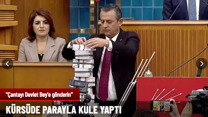 Kürsüye bir çanta dolusu parayla çıktı