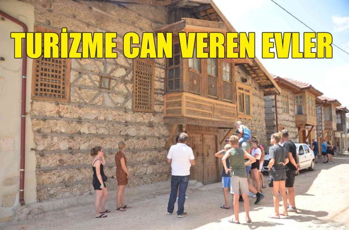 Turizme can veren evler